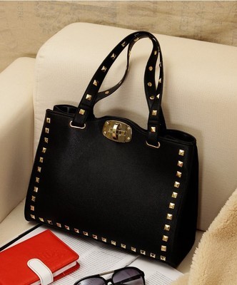 2014春季新款歐美風(fēng)流蘇手提女包 廠家直銷，彰顯個性與大氣